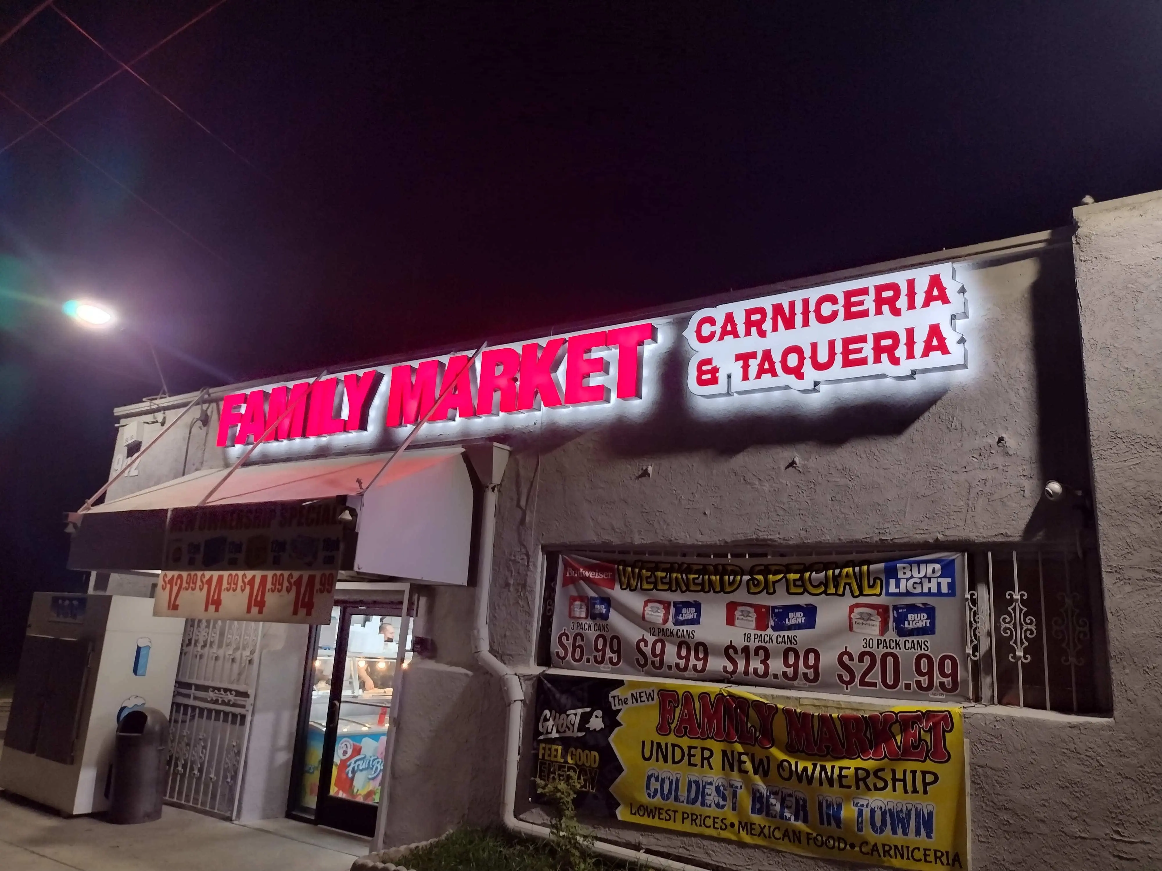 Sign with light fixture Visalia